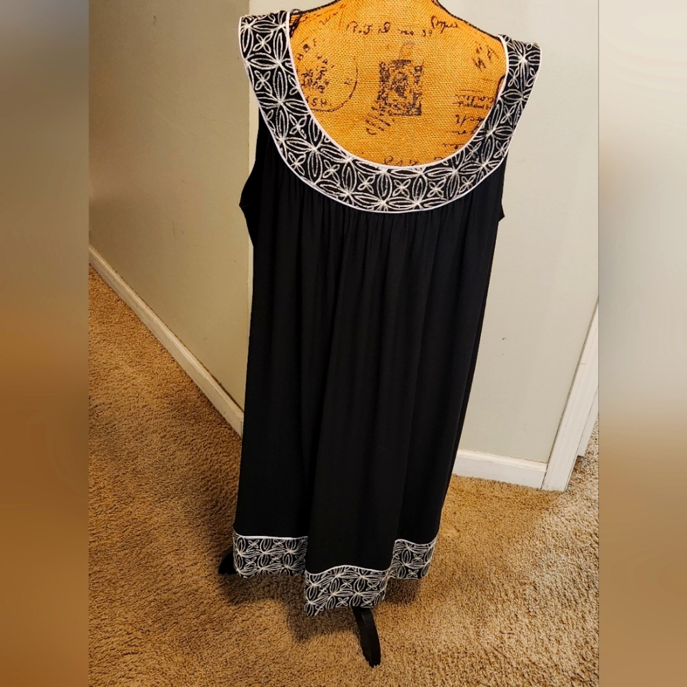 Black Sleeveless Dress with White Embroidery